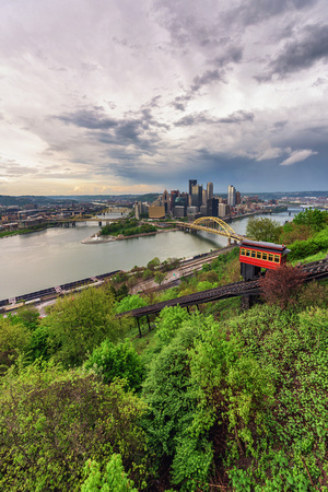 An incline climbs Mt. Washington surrounded by beautiful foliage in Pittsburgh