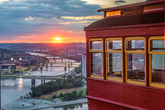 The sun rises by the Duquesne Incline in Pittsburgh