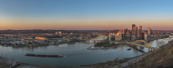 Panorama of Pittsburgh at dusk during a Pirates game