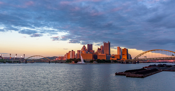 The Pittsburgh skyline glows at dusk