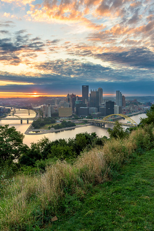 The sun rises over Pittsburgh from Point of View Park
