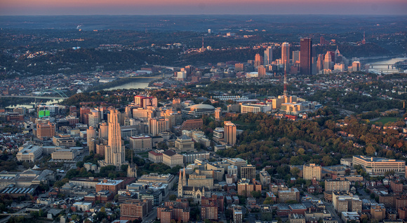 The University of Pittsburgh and the skyline glow at dawn from the air