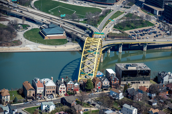 The Ft. Pitt Bridge emerges below Mt. Washington in Pittsburgh