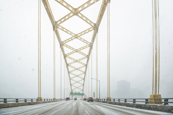 Pittsburgh fades into the snow storm on the Ft. Pitt Bridge