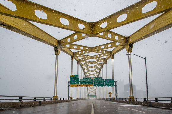 Snow falls on the Ft. Pitt Bridge in Pittsburgh