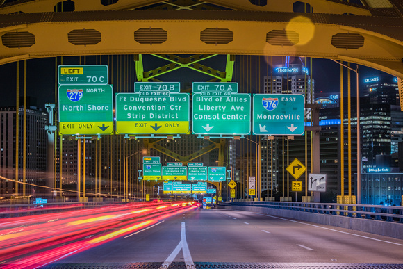 Cars rush into Pittsburgh over the Ft. Pitt Bridge