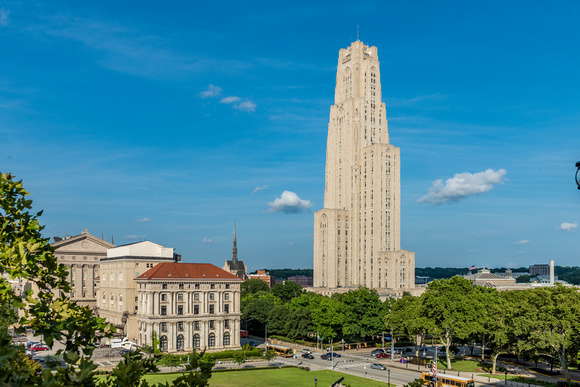 The Cathedral of Learning towers into a blue sky