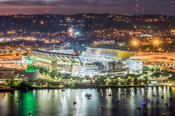 Fireworks go off behind Heinz Field in Pittsburgh during the Kenny Chesney concert