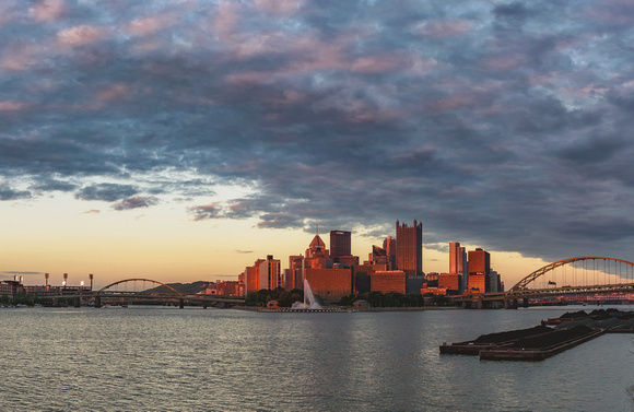 Panorama of Pittsburgh lit up at dusk