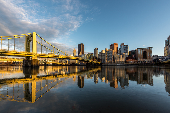 Pittsburgh reflects in the still waters of the Allegheny River at dusk