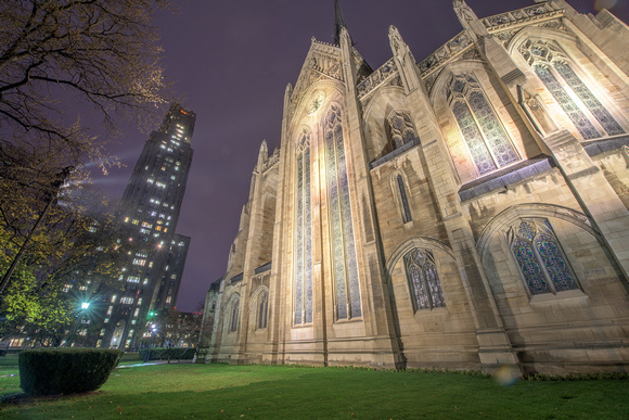 The Cathedral of Learning and Heinz Chapel glow in the rain