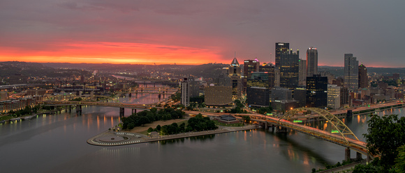 The color fills the sky on a cloudy morning in Pittsburgh