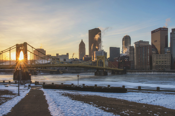 Sunflare through the Andy Warhol Bridge in Pittsburgh in the snow