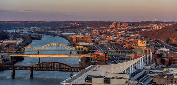 Light shines on the Strip District in Pittsburgh at dusk