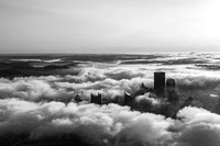 Black and white view of Pittsburgh on a foggy morning from the air