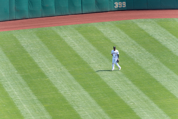 Andrew McCutchen and his shadow wander centerfield at PNC Park
