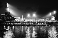 A black and white view of PNC Park from the river