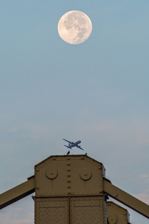 A bird, a plane and the full moon in PIttsburgh