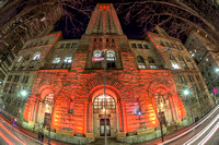 The Courthouse in Pittsburgh is lit up red at night