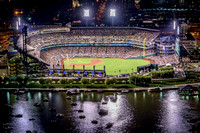 A view of PNC Park in Pittsburgh from a rooftop at night