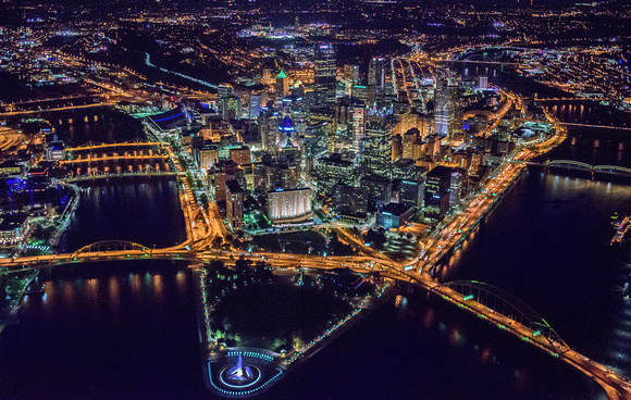 Pittsburgh glows at night in this aerial from over the Point
