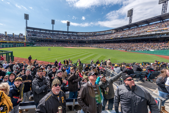 Fans watch the review of a call on the jumbotron at PNC Park in PIttsburgh on Opening Day 2016