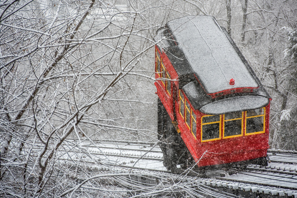 The Duquesne Incline through the snowy branches in Pittsburgh
