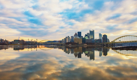 Panorama of Pittsburgh reflecting in the rivers on New Year's Day 2017