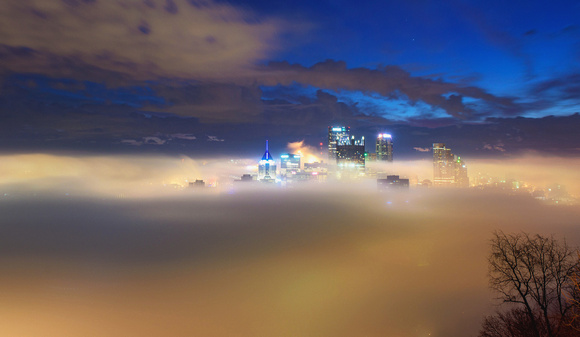 Fog engulfs downtown Pittsburgh just before dawn from Mt. Washington