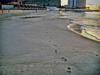 Footprints in the sand in Cancun