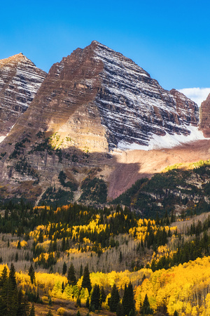 Snow and beautiful fall colors on Maroon Bells in Colorado