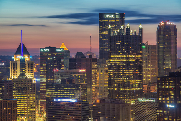 Buildings rise in downtown Pittsburgh before sunrise