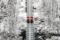 The Duquesne Incline cars pass each other after a snowstorm