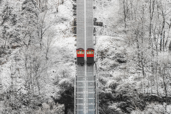 The Duquesne Incline cars pass each other after a snowstorm