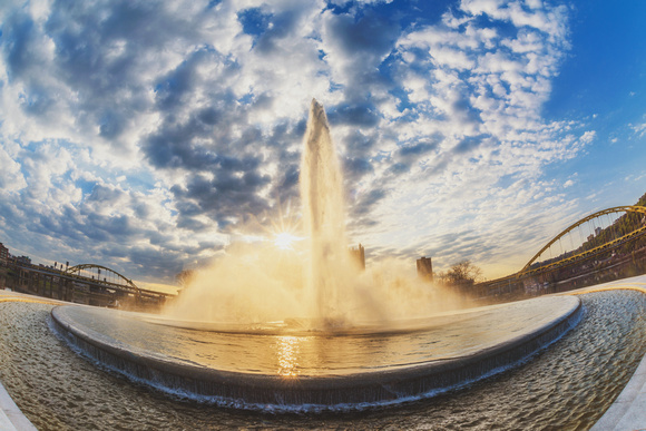 A sunflare through the fountain at Point State Park in Pittsburgh