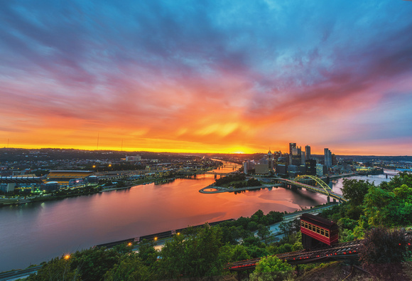A vibrant sunrise over the Duquesne Incline in Pittsburgh
