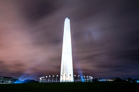 The Washington Monument casts a shadow on low clouds in Washington DC