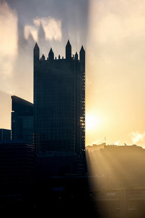 Beautiful light behind PPG Place on a foggy morning