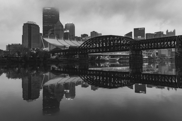 A black and white view of a foggy morning along the Allegheny River