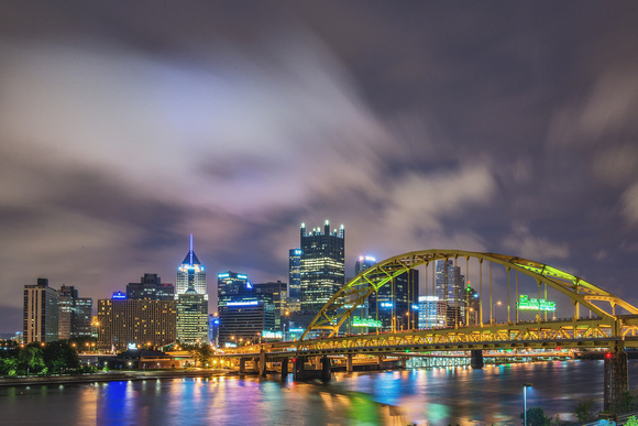Clouds rush over the Pittsburgh skyline in the early morning
