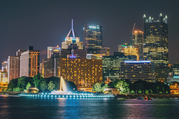 Pittsburgh skyline and fountain from the South Shore at night