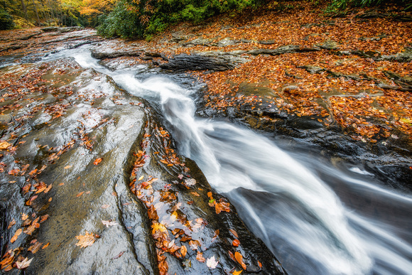 Water twists and turns as it makes its way down the natural rock slides at Ohiopyle State Park HDR