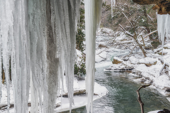 Ice hanging down in front of the rapids at Ohiopyle State Park