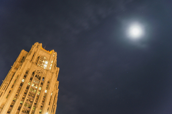 A full moon over the Cathedral of Learning