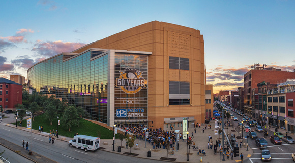 Fans rush into PPG Paints Arena during the Pittsburgh Penguins home opener