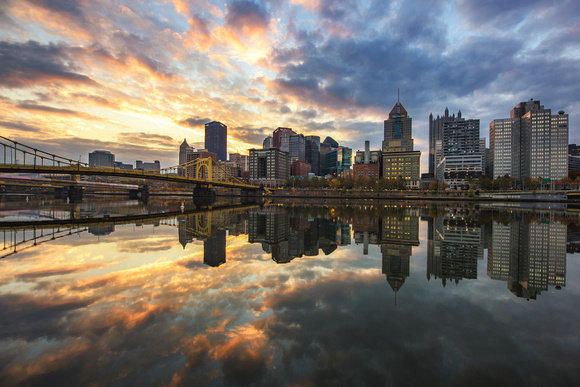 A beautiful sunrise reflects in the Allegheny River in Pittsburgh