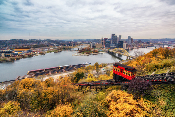 An incline makes its up Mt. Washington through the fall foliage in Pittsburgh