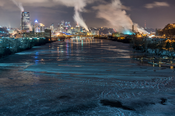 View of Pittsburgh from the 31st Street Bridge over an ice covered Allegheny River