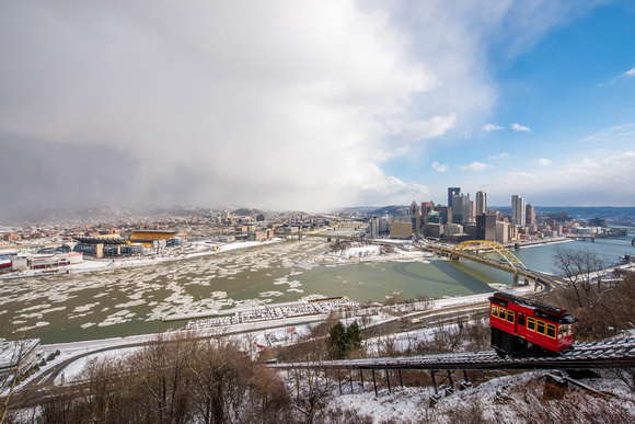 An incline rises Mt. Washington during a snow squall in Pittsburgh