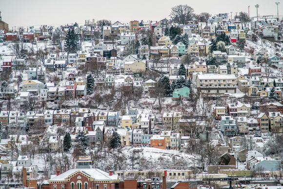 A snow covered view of the South Side Slopes in Pittsburgh